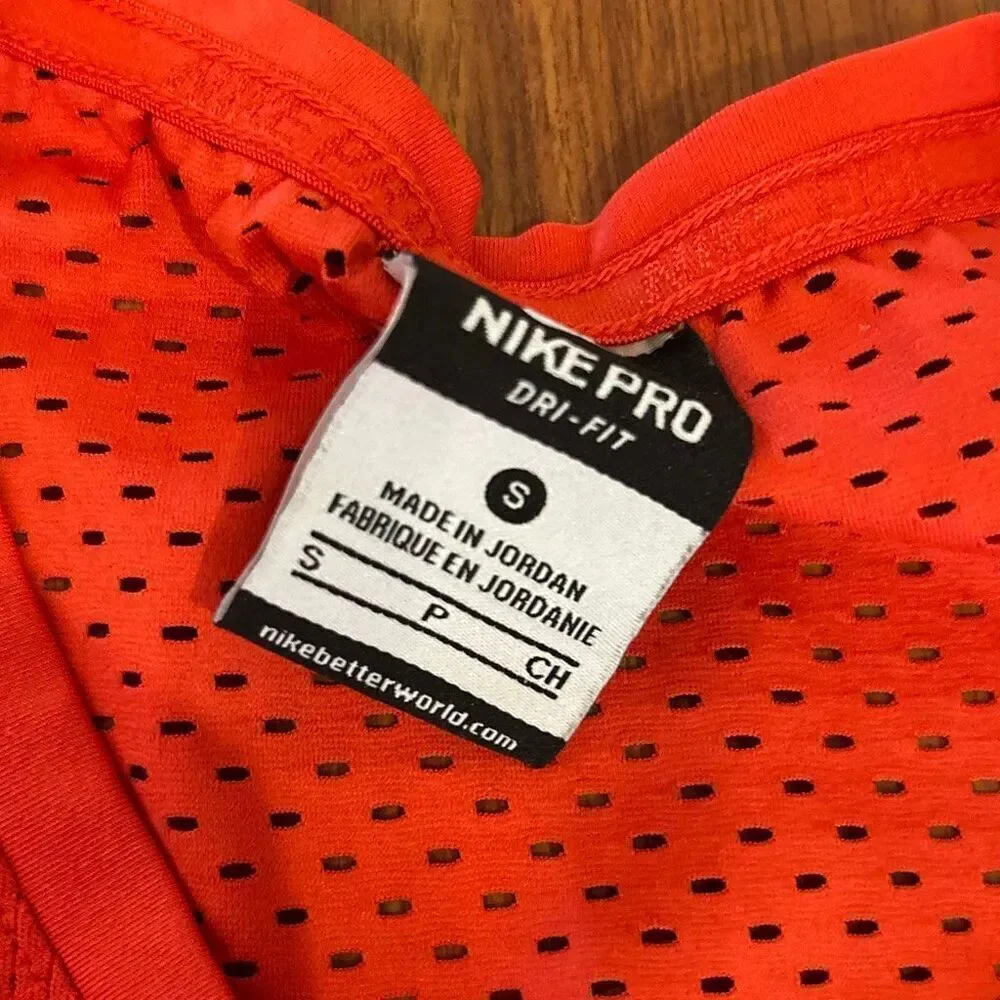 Nike Pro Dri-fit red short sleeve fit top athletic top with mesh inserts and bac